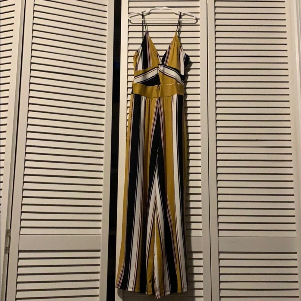 Yellow, black, white and red jumpsuit